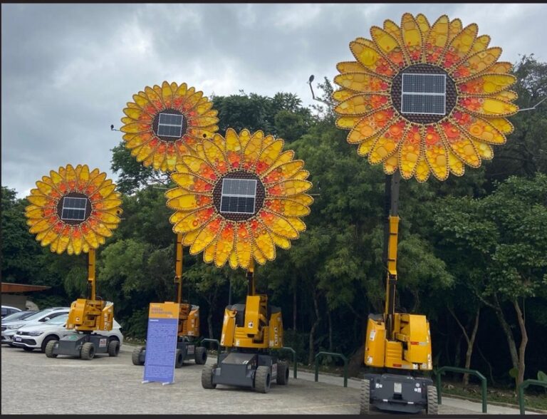 Com “girassóis gigantes”, Mills leva segurança em altura à Faria Lima, em intervenção urbana da Virada Sustentável